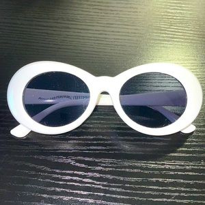 Petals and Peacocks NEVERMIND Sunglasses in white